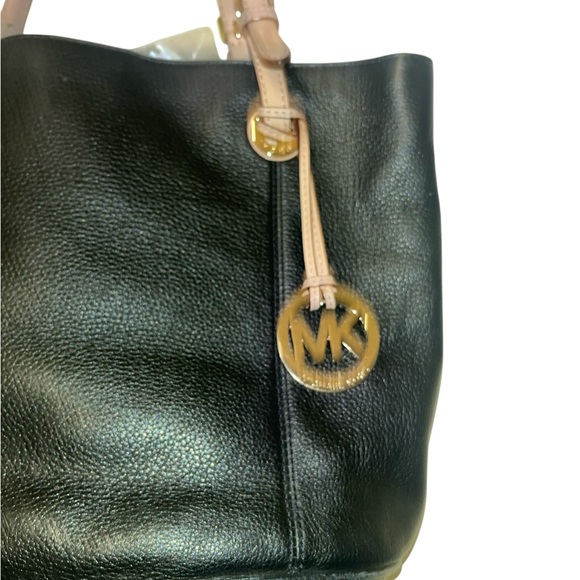 Micheal Kors Authentic black leather with tan straps bucket purse. - Picture 2 of 5